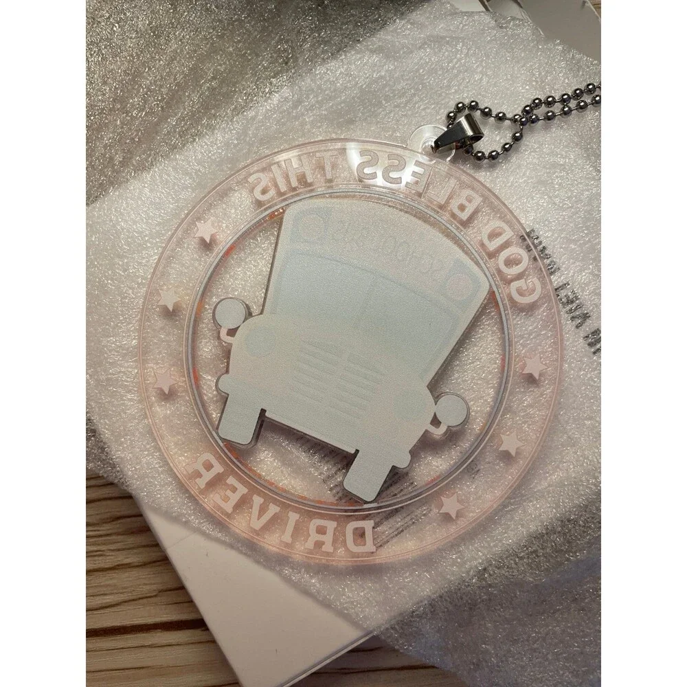 God Bless This Driver acrylic car hanging ornament, commonly used as a rearview
